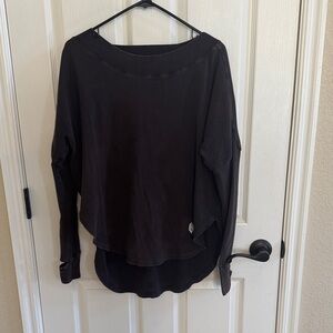 FP Movement Long sleeve top. Longer length with slouchy fit. Size XS. Washed blk